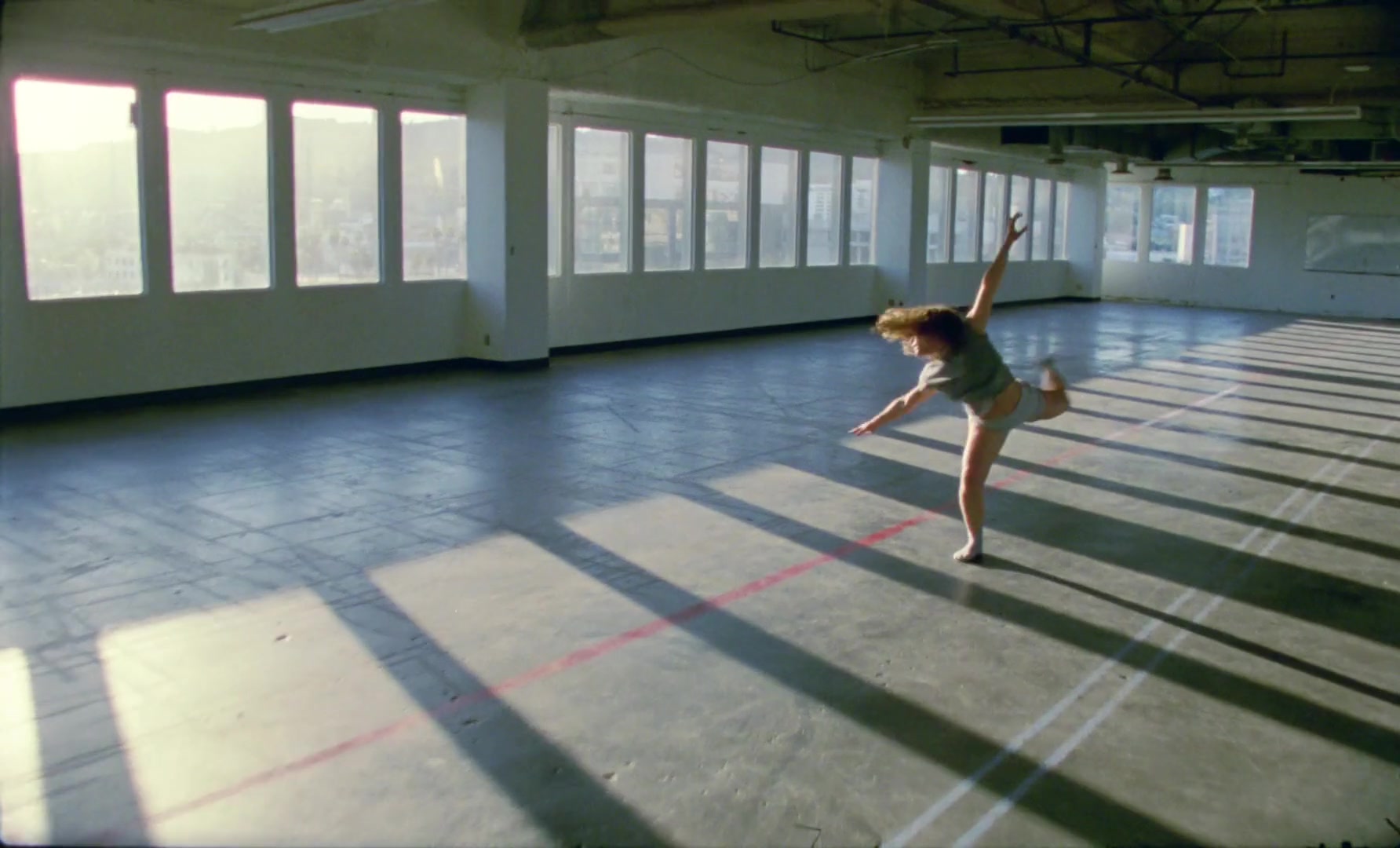 Planetarium — Dancer in a sunlit studio